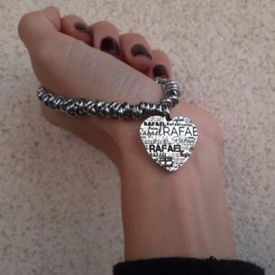 Bracciale con anelli a nodo e ciondolo a forma di cuore